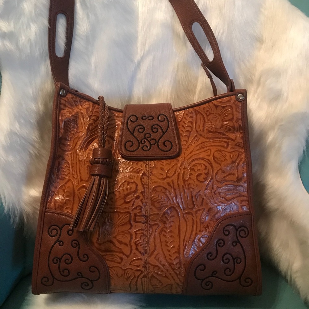 M.C. Tan Leather Embossed Handbag